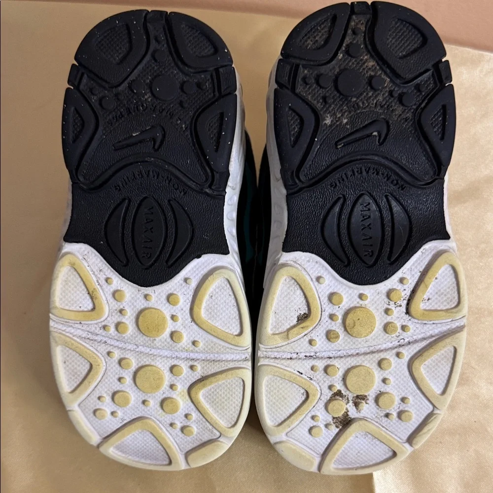 Nike Kids Black Sneakers with Iridescent Purple Accents